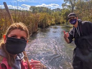 Photo of Elisabeth Harrahy and Austin Draper in the field.