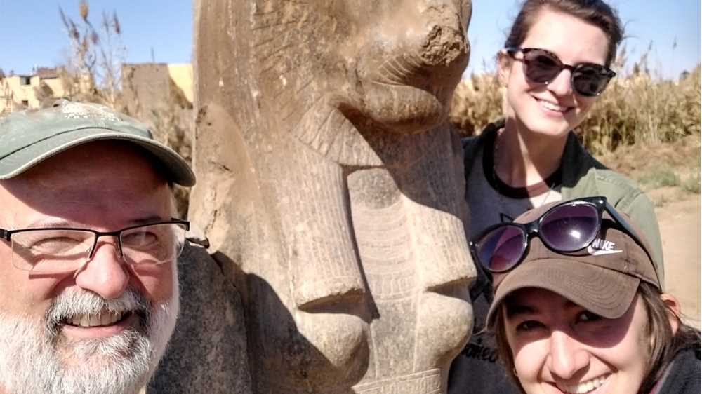Photo of UWL Professor Dave Anderson and alums Nicolette Pegarsch (upper right) and Shannon Casey, who spent January 2022 scanning statues of the goddess Sekhmet at the Mut Temple in Luxor, Egypt. Pegarsch and Casey described it as the trip of a lifetime.
