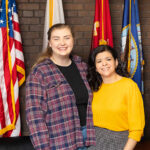 Photo of student veterans at UW-Milwaukee: “UWM has changed my life,” says Autumn Carroll (left), who came to the university after serving in the military as an Army combat medic in Kuwait and Iraq. She says the Military and Veterans Resource Center, run by Yolanda Medina (right), helped her find her way. (UWM Photo/Elora Hennessey)