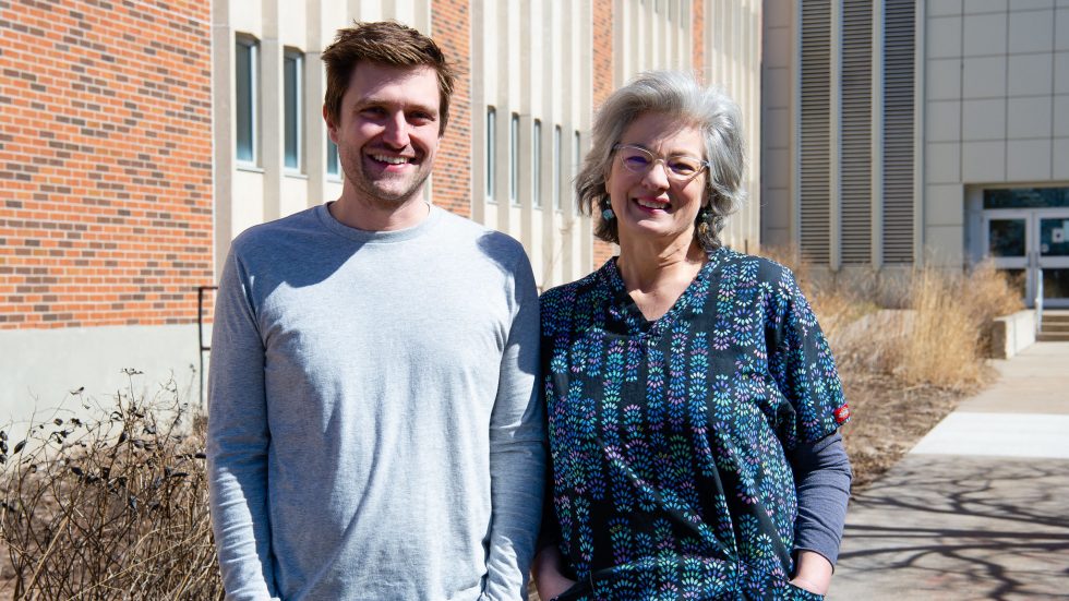 Photo of Ben Sajdak ’13, with Fauna Bio, and Dana Merriman, UWO biology professor emeritus, who will collaborate on 13-lined ground squirrel research through a new partnership.