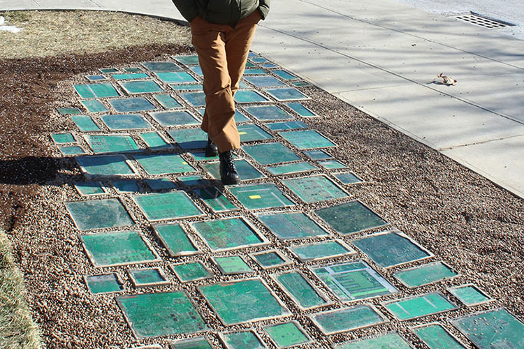 Photo of “Circuit Boardwalk” featuring 200 square feet of tiles made primarily of discarded circuit boards and concrete composed almost entirely of recycled materials. (Photo courtesy of Nathaniel Stern)