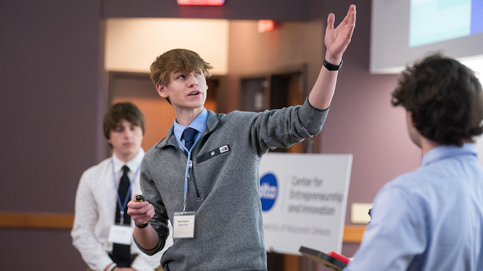 Photo of a Wisconsin high school team facing off in business model pitch contest at UW Oshkosh