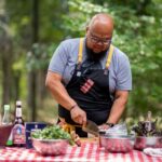 Photo of Yia Vang, '10, owner of Union Hmong Kitchen in Minneapolis, who has established himself as one of the most celebrated chefs in he Midwest. In June, he was featured in Netflix's reboot of "Iron Chef." PHOTO CREDIT: Lauren Cutshall