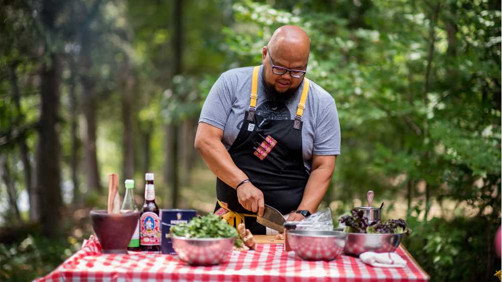 Photo of Yia Vang, '10, owner of Union Hmong Kitchen in Minneapolis, who has established himself as one of the most celebrated chefs in he Midwest. In June, he was featured in Netflix's reboot of "Iron Chef." PHOTO CREDIT: Lauren Cutshall