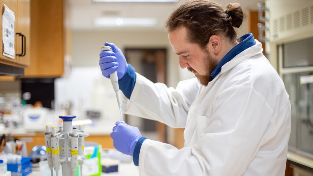 Photo of Garrett Larsen, who worked in UW-Platteville's plant-microbe symbioses laboratory for four years.