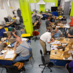 Photo of educators from around Wisconsin gathered in the Fab Lab on June 30, 2021. They spent the day working on varying equipment with a focus on how the learning process worked for them as opposed to the use of specific tools they may or may not have at their home institutions.