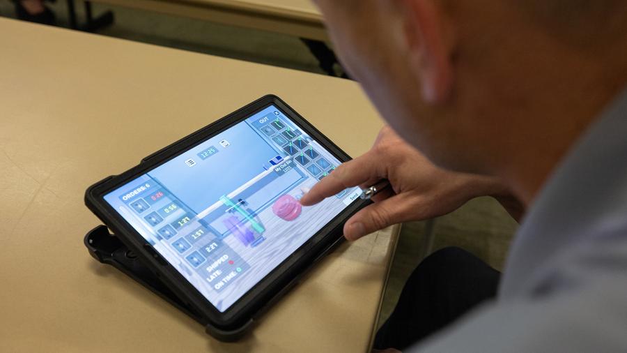 Photo of Buzz Digital teaches Lean manufacturing principles using tablets. / UW-Stout