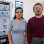Photo of Dr. Yanwei Wu and Dr. Xiaoguang Ma (pictured left to right), along with Dr. Fang Yang, who will research and build a prototype of a smart microgrid testbed.