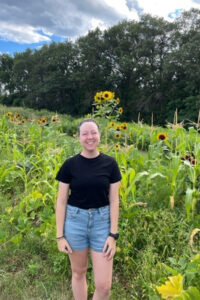 Photo of LAKES REU and UW-Madison student Laura Flucke visits a Menomonie area farm / Laura Flucke