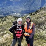 Photo of geology majors Bryanna Rayhorn (left) and Lindsey Henricks spent their summer living on a mountain range above the Arctic Circle while working for a geological consulting firm in northern Alaska. The area was so remote that they had to take a helicopter to get to work every day, something the Blugolds say added to their experience. Both say they gained skills and confidence, which will help them in their future careers. (Submitted photo)