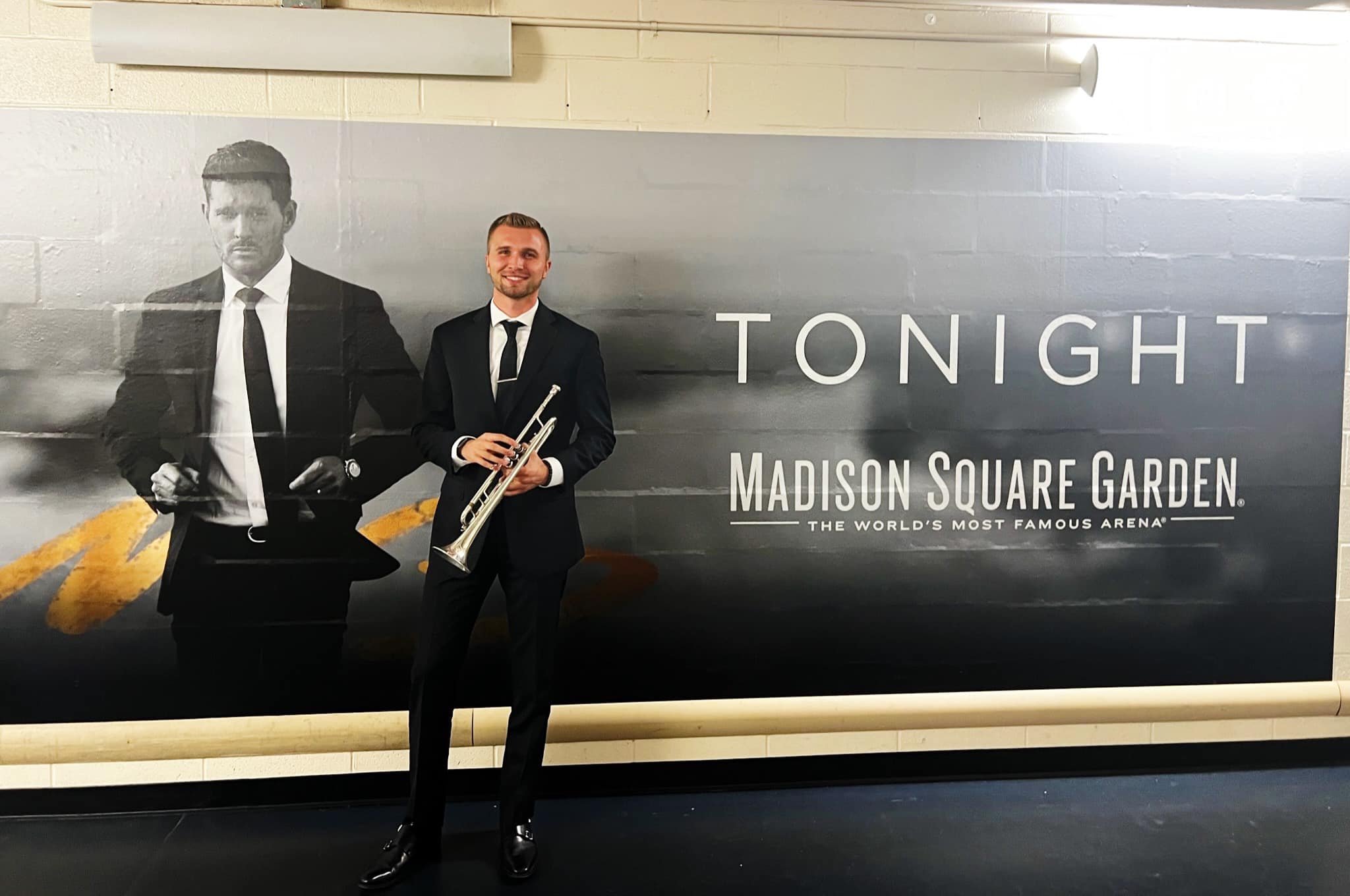 Photo of Zachary Finnegan, 2018 UWSP alumnus, who performed on trumpet at Madison Square Garden recently as a member of singer Michael Bublé’'s band.