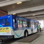 Photo of a La Crosse MTU bus making a stop downtown at Grand River Station. PHOTO CREDIT: Susan Gaeddert