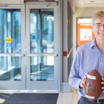 Photo of Paul Roebber, a UWM professor of mathematical sciences, who led a research team that used machine learning and 10 years of NFL play-by-play data to show that momentum in sports is a real phenomenon. (UWM Photo/Troye Fox).