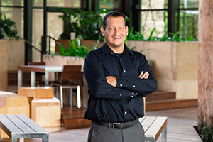 Photo of Jason Dropik, who is head of school at the Indian Community School in Franklin and a member of the Bad River Band of Lake Superior Ojibwe. Dropik said he felt it was important to continue to enhance his skills as an administrator and leader. (UWM Photo/Elora Hennessey)