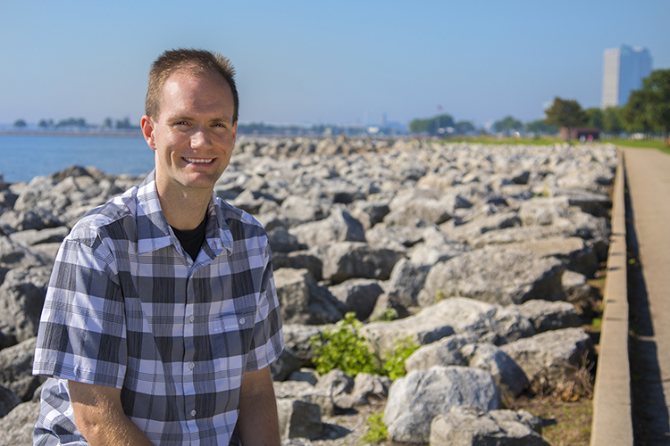 Photo of Clark Evans, professor of atmospheric science in the School of Freshwater Sciences, who maintains a website that translates meteorological data into an accessible format so that it can be used to create maps. The graphics are also available every six hours through a Twitter account that is linked to the storm data. (UWM Photo Services)