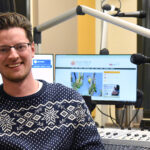 Photo of Alex Crowe, a 2015 graduate of the University of Wisconsin Oshkosh’s radio TV film (RTF) program, who recently became WPR’s host of NPR’s Morning Edition.