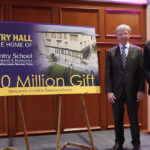 Photo of UW-Stevens Point Chancellor Thomas Gibson (right) and Pete McPartland, chairman of the board, president and CEO of Sentry, announcing a $10 million gift to the School of Business and Economics today (Dec. 15), the largest gift the university has received.