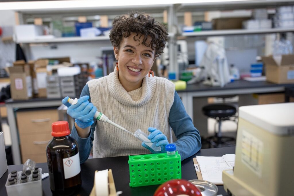 Photo of December graduate Chloe Gulbronson, who worked in biology, chemistry and physics labs while earning her degree in biochemistry at UWSP.