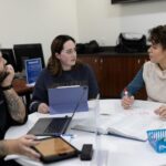 Photo of Chloe Gulbronson (right), who served as a tutor for chemistry, biology, physics and math and also mentored tutors while pursuing her degree at UW-Stevens Point. Here, she’s with students Mitchell Imlan and Josie Voigt in the Chemistry Biology Building drop-in tutoring lab.