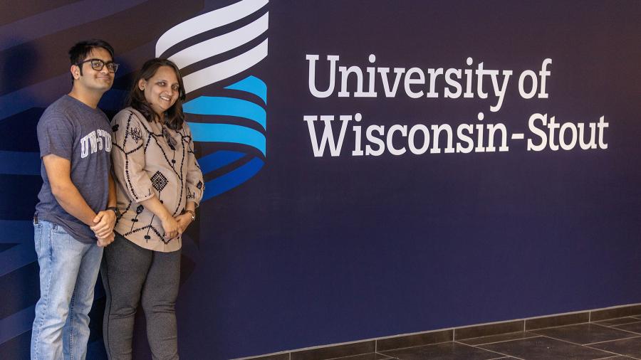 Photo of Pednekar, who is recruiting students from India, such as Vini Tapadiya, left, to attend UW-Stout. / UW-Stout