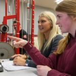 Photo of UW-La Crosse Exercise and Sport Science Department students Anna Jacobson, left, and Makenna Carpenter who are two of the students who have participated in the Seed Grant Program in cooperation with Mayo Clinic Health System. Led by teams of physicians and scientists from both institutions, seed grants often launch promising new research projects and provide valuable preliminary data to attract more substantial funding from external sources. (UWL photo)