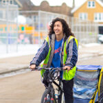 Photo of Gianni Vaccaro delivering meals in Riverwest one recent day. (UWM Photo/Elora Hennessey)