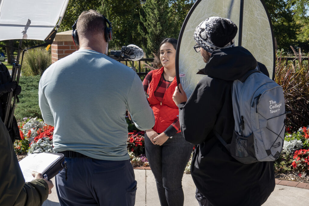 Photo of UW-River Falls student Giselle Nunez, from Cottage Grove, Minn., being interviewed on campus as part of “The College Tour” television series. Ten UWRF students interviewed for the show will be part of the program aired on Amazon Prime and other broadcast outlets on March 22. Pat Deninger/UWRF photo