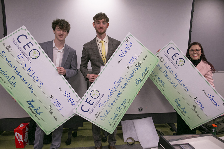 Photo of six student entrepreneurs who competed for $3,000 in prizes to grow their young businesses at the Warhawk Business Plan Competition at the Whitewater Innovation Center on Wednesday, April 27, 2022. The event was organized by the Collegiate Entrepreneurs’ Organization (CEO). From left, contest winners Hayden Pauls, Menomonee Falls, third place; Chad Tjugum, Sun Prairie, first place; and Kara Zamora, Mount Pleasant, second place. All are entrepreneurship majors.