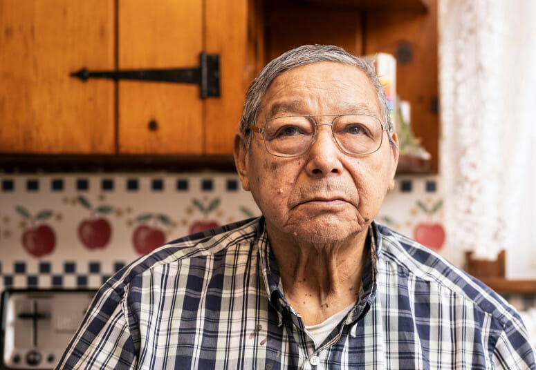 Photo of Cecil Garvin, a highly respected Ho-Chunk elder who has devoted much of his professional life to the preservation and promotion of the Ho-Chunk language and Indigenous culture, pictured at his home in Madison. PHOTO: JEFF MILLER