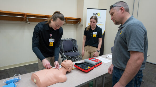 Photo of UWO nursing students holding emergency intervention training for faculty, staff and others at the Fond du Lac campus Thursday.