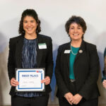 Photo of UW-Parkside Chancellor Dr. Debbie Ford, center-right, and WiSys Regional Intellectual Property and Licensing Associate Allee Marti, left, congratulating UW-Parkside students Elise Zevitz, center-left, and Elisa Kurber, right, for their successful participation in the WiSys Quick Pitch @ UW-Parkside (Photo courtesy of Laura Mason, UW-Parkside).