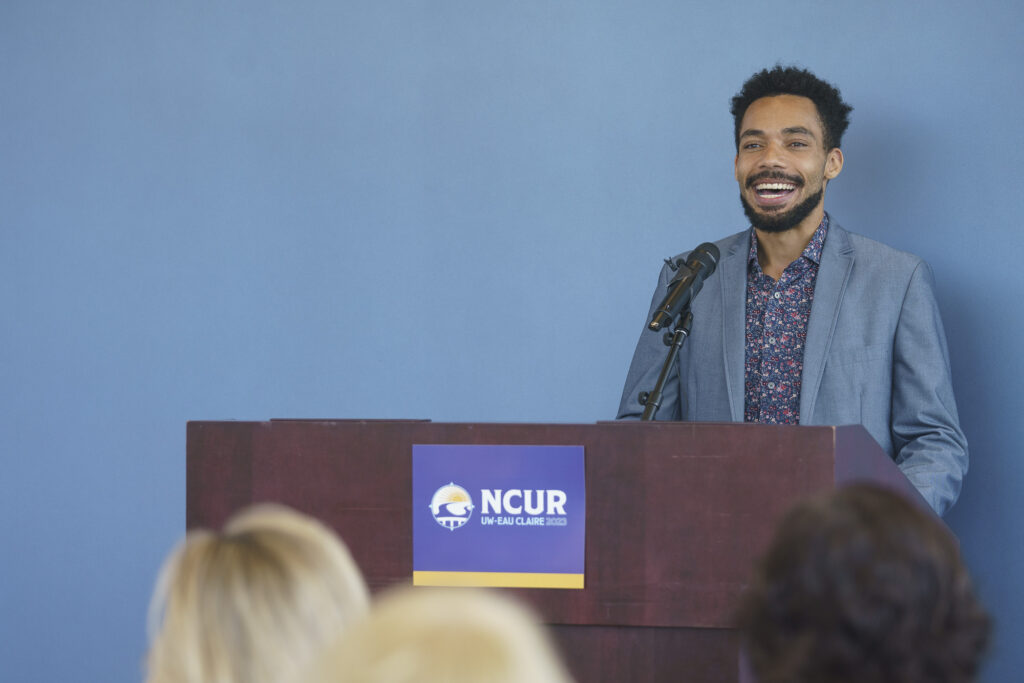 Photo of Dr. Tayo Sanders, a UW-Eau Claire graduate who was selected for the prestigious Rhodes Scholarship program, returning to his alma mater this spring to talk about how his faculty mentors and undergraduate research experiences continue to shape his life and career. (Photos by Bill Hoepner/UW-Eau Claire)