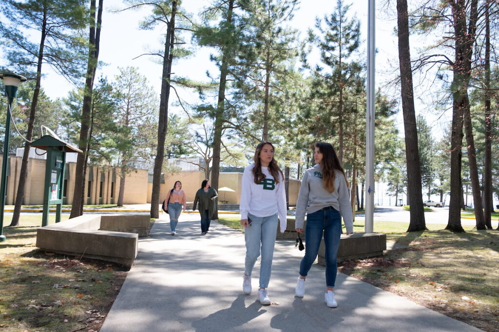 Photo of UW-Green Bay, Marinette Campus students enjoying a warm walk to class.