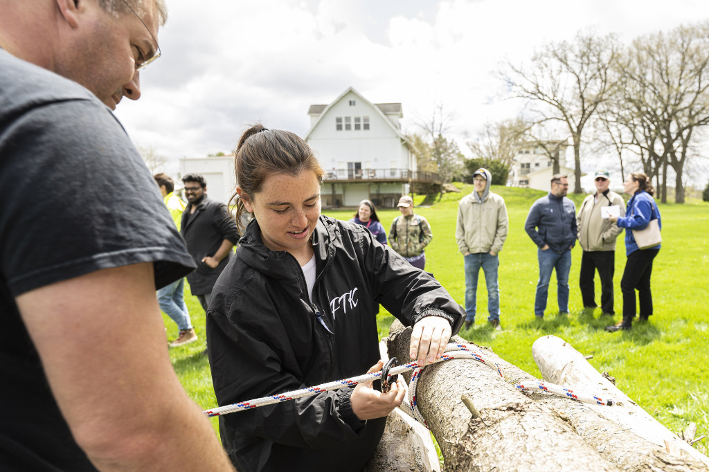 Photo of Terry Bradshaw (left), president of the Menasha River Alliance, giving a rope technique demonstration with UW-Madison student Hannah Agner. (Photo by Bryce Richter/UW-Madison)