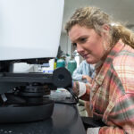 Photo of UW Oshkosh biology student in ERIC lab