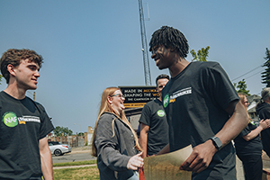 Photo of Zion Owusu-Yeboa (right), a student at Ronald Reagan High School, who said the group modified its plans based on feedback from neighborhood residents. With him is Ethan Erenz, a UWM student who served as camp counselor. (Photo courtesy of MPS/Alvin Connor)