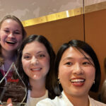 Photo of UW-River Falls students, from left, Rafael Larosiliere, Anna Euerle, Kate Petersen, Yihong Deng, and Ashley Gruman, who won first place in a national contest by developing a dairy-based product aimed at helping ease people’s anxiety. The group won the Dairy Management Inc. New Product Competition and received the award in Chicago. Contributed photo.
