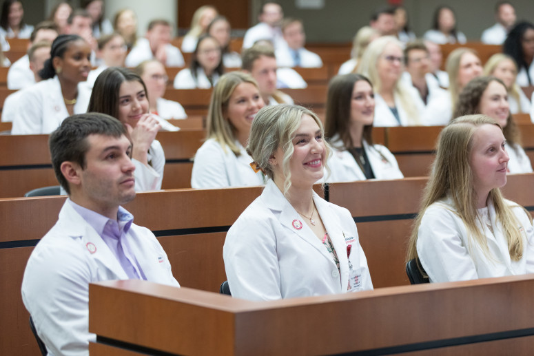 Photo of School of Pharmacy students at their pinning ceremony in May. The ceremony marks their transition from didactic course work to full-time experiential learning. UW–Madison
