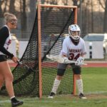 Photo of Allison Schmidli, a first-year student at UW-Stevens Point, who is looking forward to playing collegiate lacrosse after serving as a goalie for the Neenah High School team for the last three years.