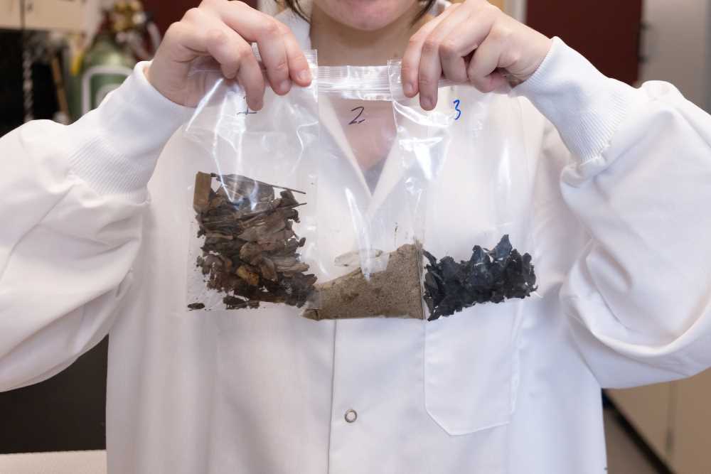 Photo of playground samples being tested. While the group is looking at trace metals in rubber, wood chip and sand surfaces, many other contaminants can make their way into playground surfaces such as polyaromatic hydrocarbons, chemicals that occur naturally in coal, crude oil, and gasoline. This study will just examine trace metal contaminants.