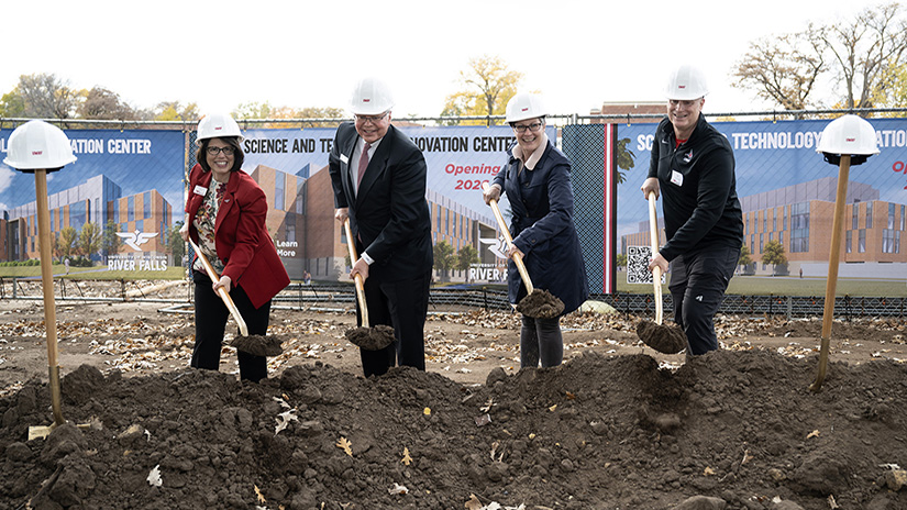 Photo of groundbreaking for UW-River Falls SciTech building: From left, UW-River Falls Chancellor Maria Gallo, Universities of Wisconsin President Jay Rothman, and River Falls business owners and UWRF alums Kristi and Jeff Cernohous participate in a groundbreaking ceremony Monday for the Science and Technology Innovation Center (SciTech) building under construction at the university. UWRF photo.