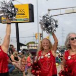 Photo of members of the 1973-74 UWL PomPons who marched in the La Crosse Oktoberfest parade this September — 50 years after their memorable appearance at the Orange Bowl in Miami. (Jen Towner, UWL University Marketing & Communications)