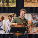Photo of UW-River Falls student Blake Zak performing at the Scholarship Recognition Event and Donor Social Oct 8, 2023. The event, organized by University Advancement, occurs annually and is designed to bring together scholarship donors and scholarship recipients