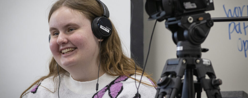 Photo of Angela Carchesi, a communication student from Franklin, recording a video in a Heide Hall classroom for her capstone project on Tuesday, Nov. 7, 2023. (UW-Whitewater photo/Craig Schreiner)