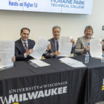 Photo of UWM Chancellor Mark Mone (center) and the leaders of four regional technical colleges, who signed an agreement Tuesday to smooth the path for tech school graduates to attend the university. From left are MATC President Vicki Martin, WCTC President Richard Barnhouse, Moraine Park President Bonnie Baerwald and Gateway President Ritu Raju. (UWM Photo/Troye Fox)