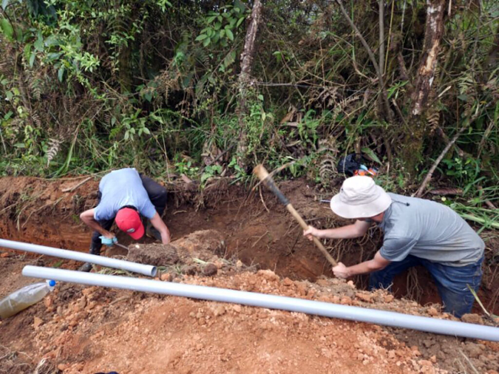 Photo of UW-Stout students part of the university’s Engineers Without Borders chapter who traveled to a village in Ecuador to help build a clean water system. A return trip is planned in 2024 to continue the two-mile-long project. / Photo courtesy of Engineers Without Borders chapter