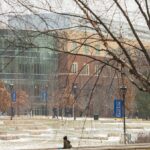 Photo of students making their way through the lower UW-Eau Claire campus during a snowy winter day.