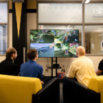 Photo of the University of Wisconsin-Superior celebrating the addition of esports to its list of extracurricular activities on Thursday, March 28, with a showcase event in its new esports gaming room.