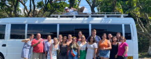 Photo of UW-Whitewater students and faculty on the road in January during a 12-day travel-study class for aspiring health care professionals in Costa Rica. (Photo courtesy Jodie Parys.)