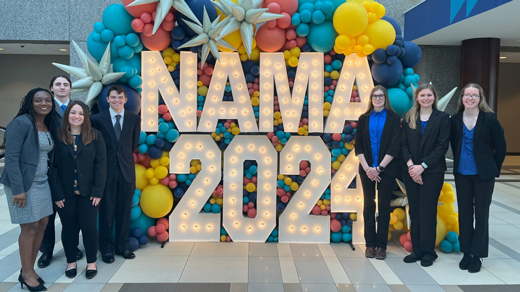 Photo of (from left) Dr. Lucie Kadjo, Alexander Monarski, Mia Dauphin, Kaleb Welhouse, Breanna Cisketti, Carol Traynor and Megan Schulenberg at the spring 2024 National Agri-Marketing Association Student Competition in Kansas City, Missouri.